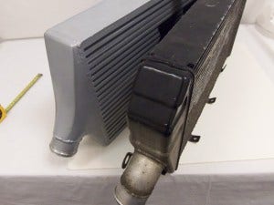 End tank comparison of Mishimoto prototype vs. stock intercooler 