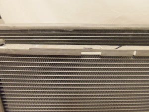 Comparison of cores: Mishimoto E90 radiator prototype 2 (top) and stock radiator (bottom)