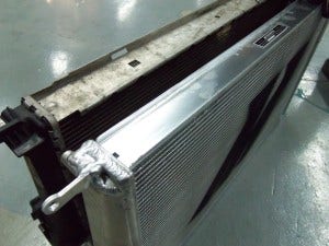 Mishimoto radiator (right) and stock radiator (left) 