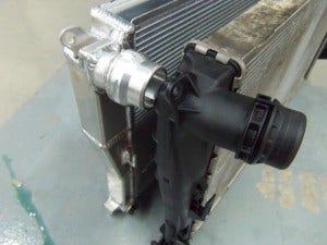 Mishimoto radiator (left) and stock radiator (right)