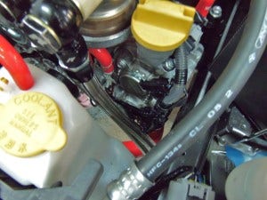 Oil line routing on the WRX