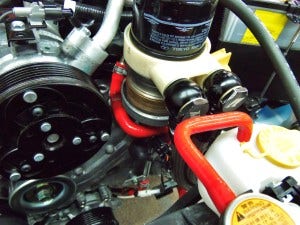 Prototype of oil sandwich plate installed with banjo fittings