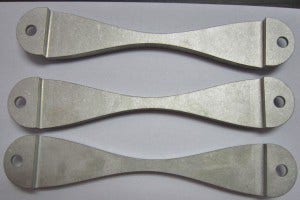 Mishimoto Subaru battery tie-down prototypes