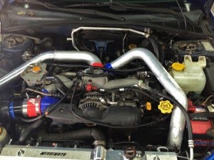 Mishimoto fabricated intercooler pipes on Bugeye