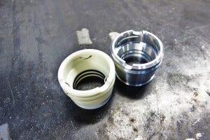 Plastic quick-disconnect fitting prototype (left) and Mishimoto CNC-machined prototype (right)