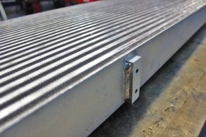 Mishimoto intercooler AC bracket mount