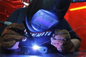 Welding the prototype Miata oil cooler bracket