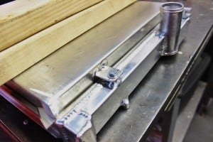 Shroud mounting tab fabrication