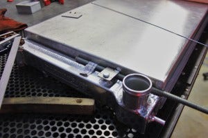 Shroud mounting tab fabrication