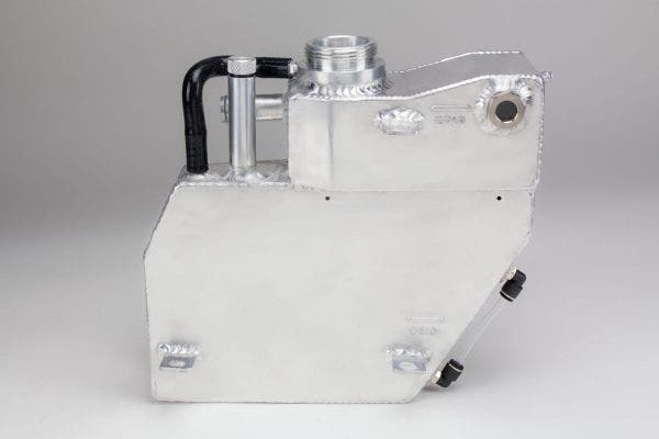 The overflow section (bottom) incorporates a sight tube, and the expansion section uses a sight glass.