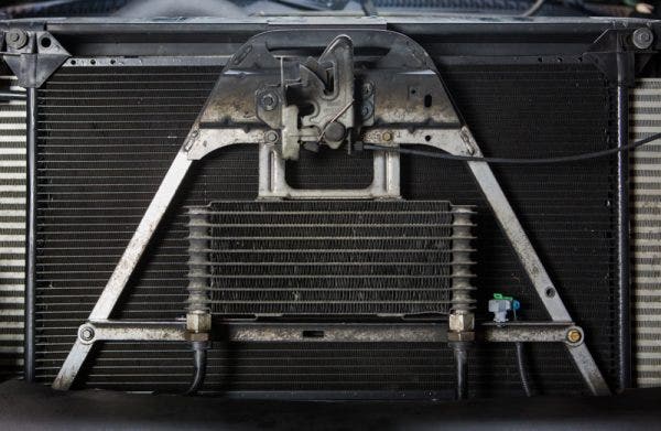 On the 2001-2005 models the cooler is mounted directly in front of the AC condenser, meaning it receives the proper airflow, however the size of the cooler still restricts it's ability to cool the transmission fluid. 