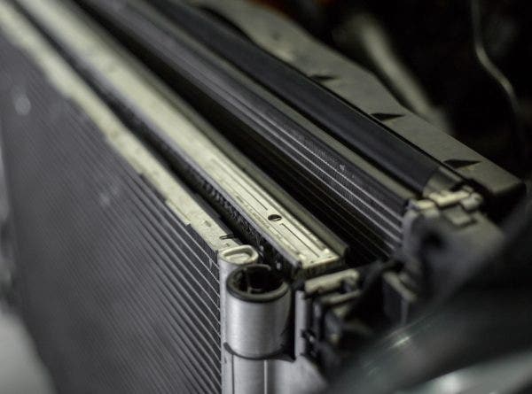 The stock design packs the AC condenser, intercooler, and radiator close together, without much room to expand into.