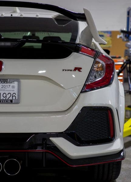 Honda put a lot of work into making sure their aerodynamics would keep the Civic handling smoothly. The last thing we would want to do is mount a catch can in the way.