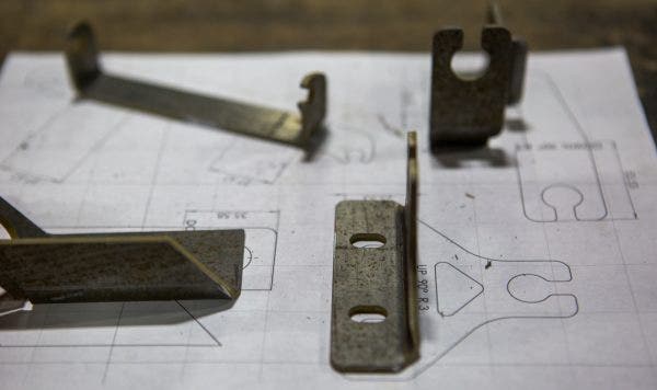 Using our selection of different presses and bending machines, we are able to bend each component for the airbox into its exact shape.