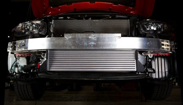 Our intercooler fills the space between the crash bar and the under body tray, maximizing the fin surface area.