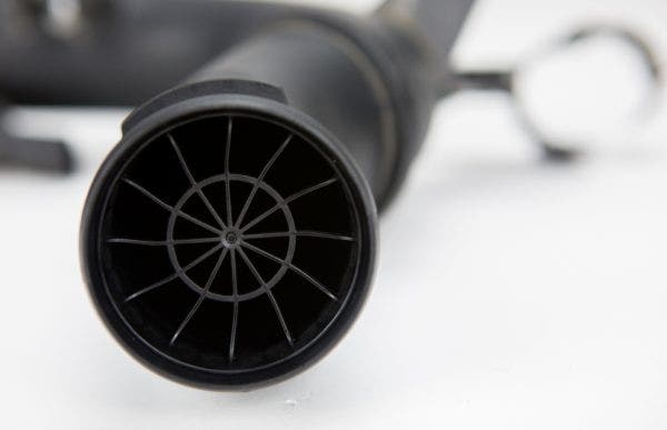 On top of a restricting piping diameter, VW also added in an air straightener to keep the intake volume down. Chances are that you didn't buy a GTI because you wanted it to be quiet.