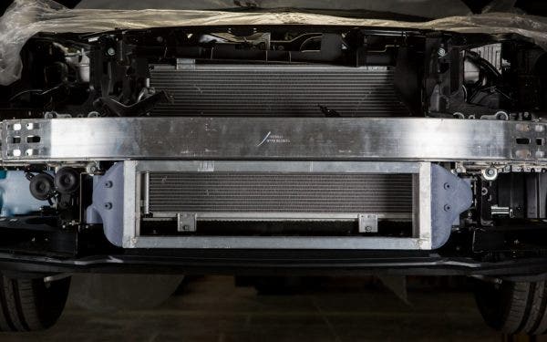 Even without the stock comparison, you can already tell that this new intercooler is going to be much larger.